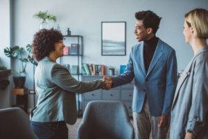 shaking hands with an agent