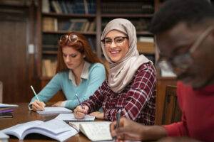 writing students in library
