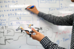 engineer at whiteboard