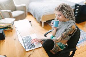 young woman writer at home