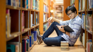 reading in the library stacks