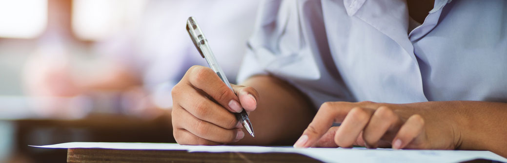 writing at classroom desk